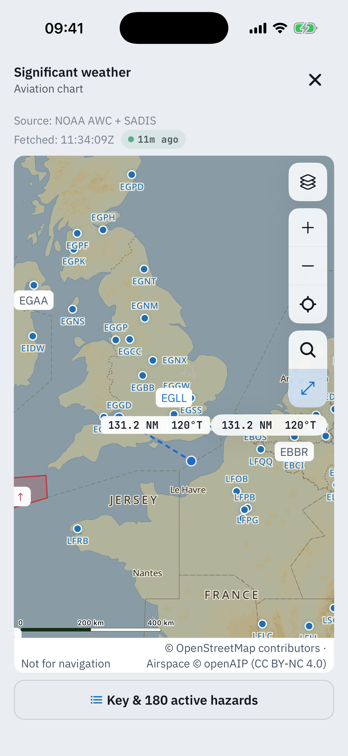 The significant weather chart with a ruler measurement drawn: a dashed blue line across southeast England with two readout chips reading 131.2 nautical miles and 120 degrees true, the airport dots and rail unchanged around it