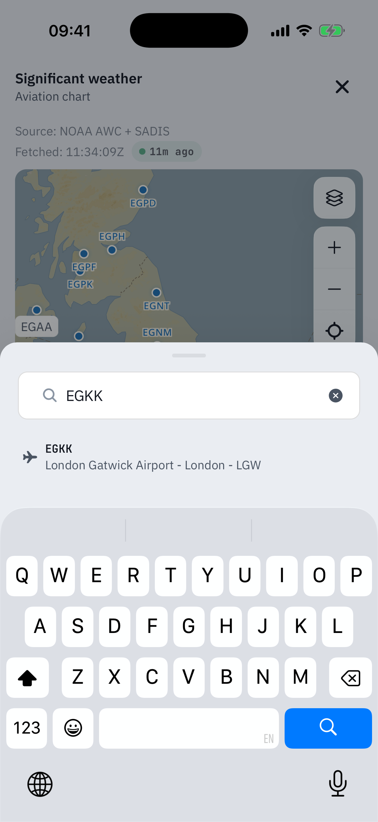 The on-map search sheet with EGKK typed into the field: one result row reading EGKK London Gatwick Airport, London, LGW with an airplane icon, the keyboard open beneath and the chart of Scotland visible above the sheet