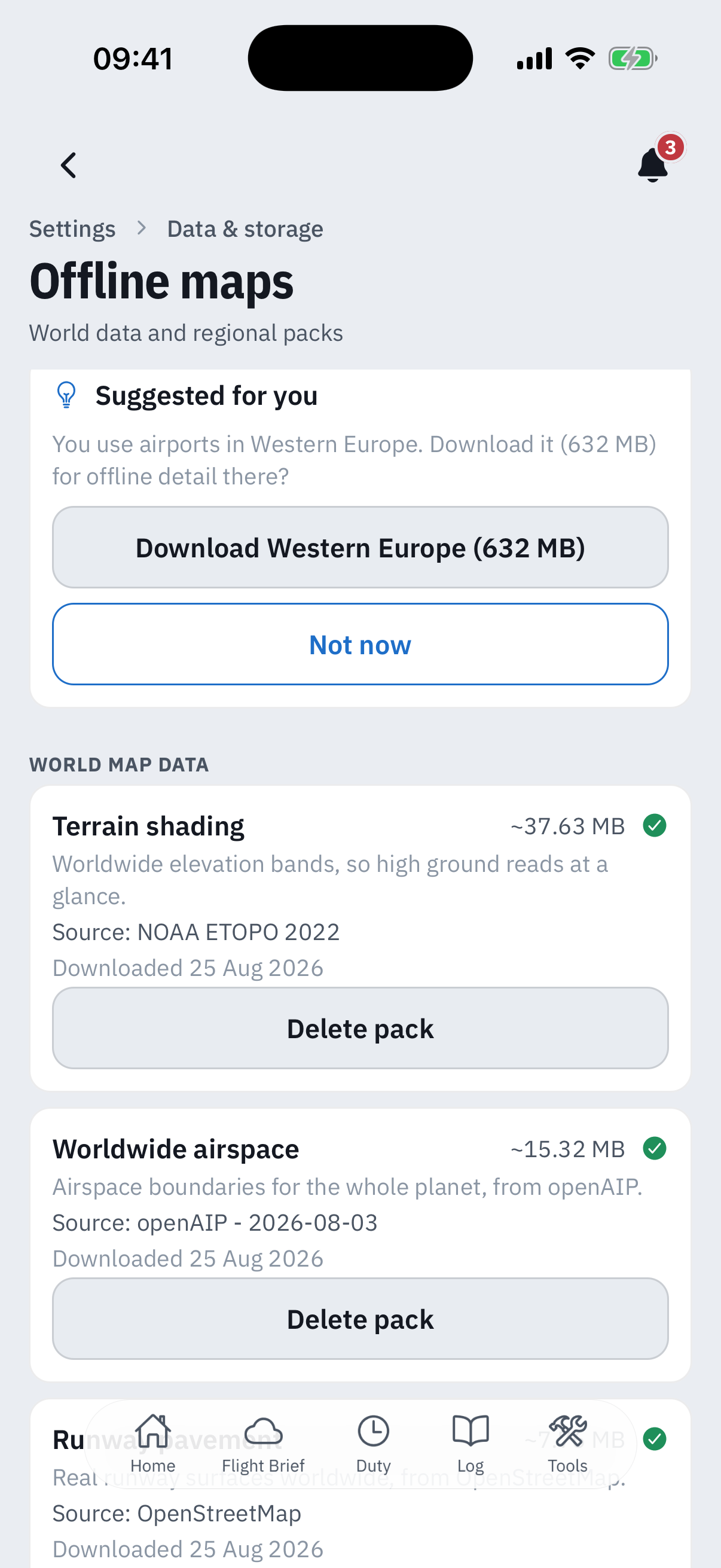 The World map data section of the Offline maps screen: a Suggested for you card offering Download Western Europe 632 MB with a Not now button, then downloaded rows with green ticks for Terrain shading about 37.63 MB from NOAA ETOPO 2022, Worldwide airspace about 15.32 MB from openAIP dated 2026-08-03, and the top of the Runway pavement row from OpenStreetMap, each with a Delete pack button