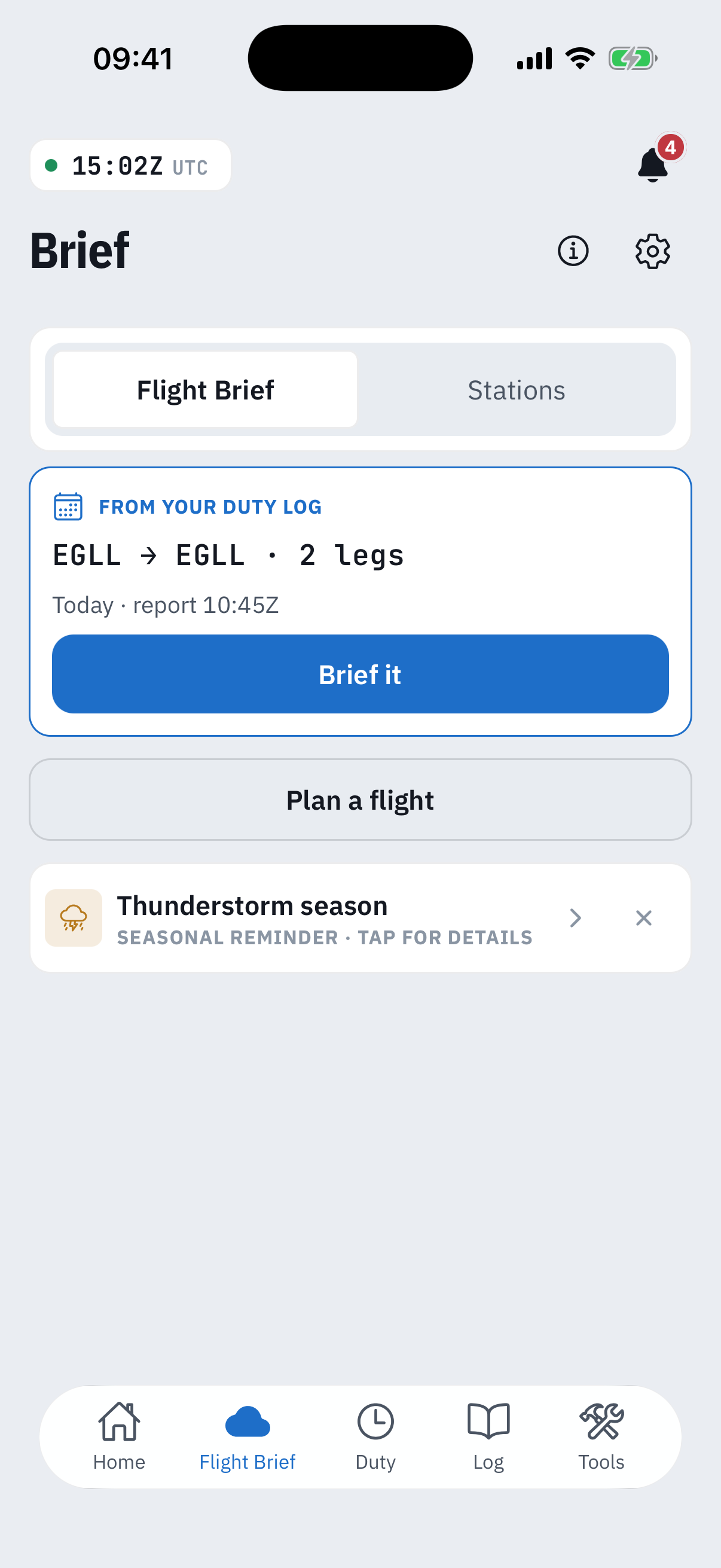 The Flight Brief launcher in the Brief tab: the Flight Brief and Stations mode toggle, a suggestion card reading From your duty log, EGLL to EGLL, 2 legs, Today, report 10:45Z with a Brief it button, a Plan a flight button beneath it and a Thunderstorm season seasonal reminder card