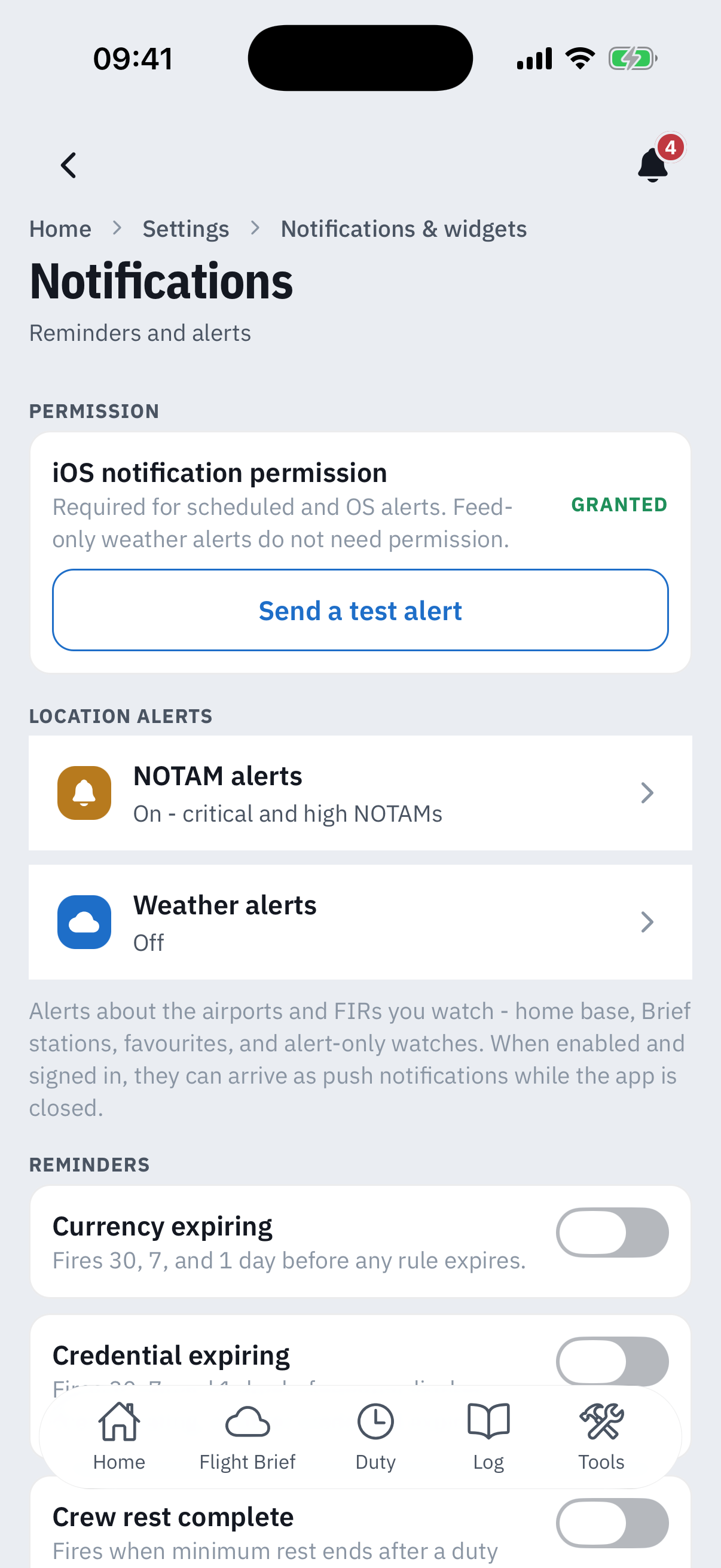 The Settings Notifications screen: an iOS notification permission card marked Granted with a Send a test alert button, Location alerts rows reading NOTAM alerts, on for critical and high NOTAMs, and Weather alerts, off, a caption about watched airports and FIRs, then the top of the Reminders list with Currency expiring and Credential expiring toggles